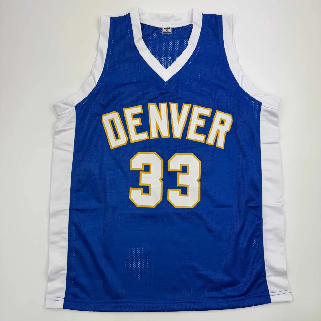 Blue basketball jersey with white trim for David Thompson HOF professional sports collectible