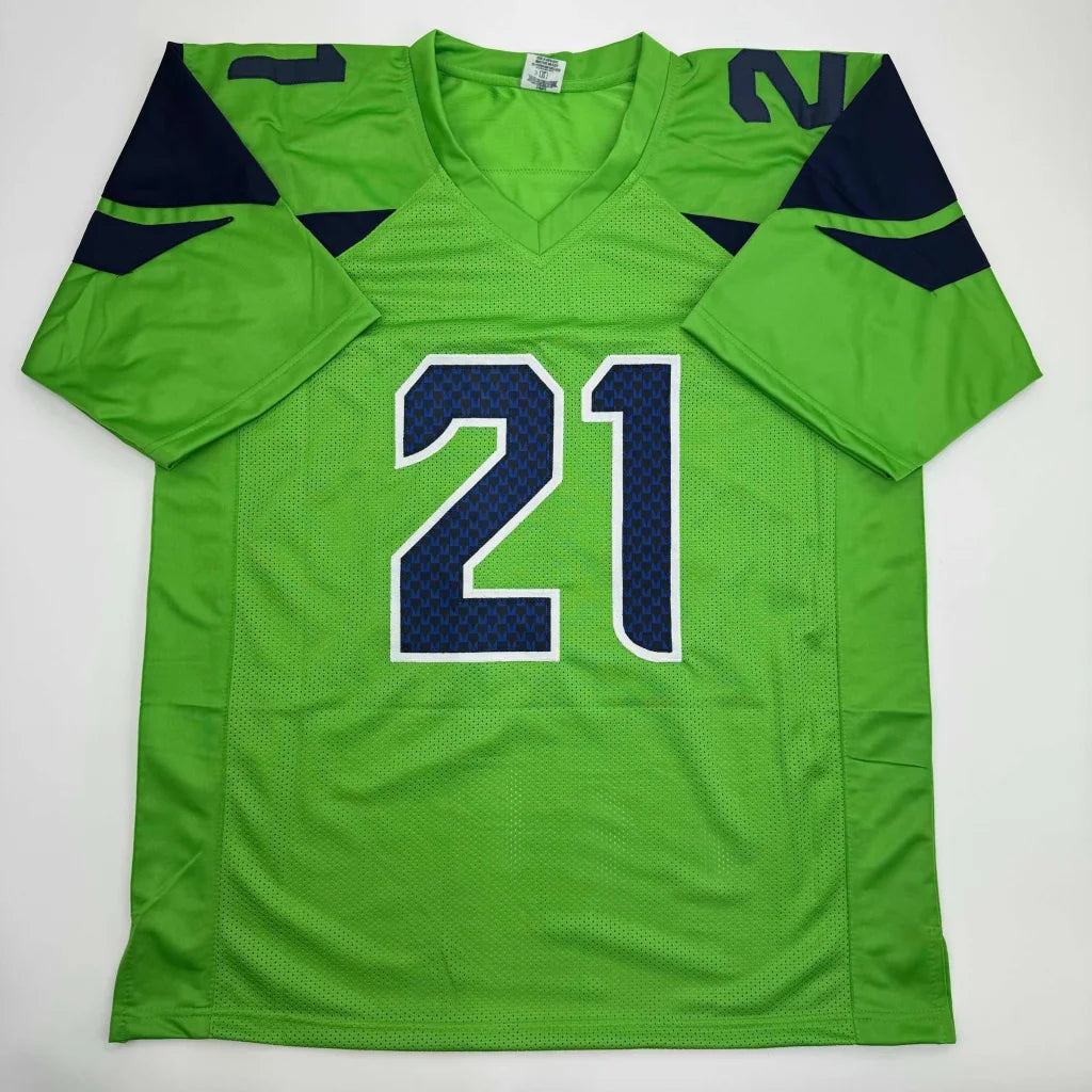 Lime green Witherspoon 21 professional sports league jersey with navy blue accents