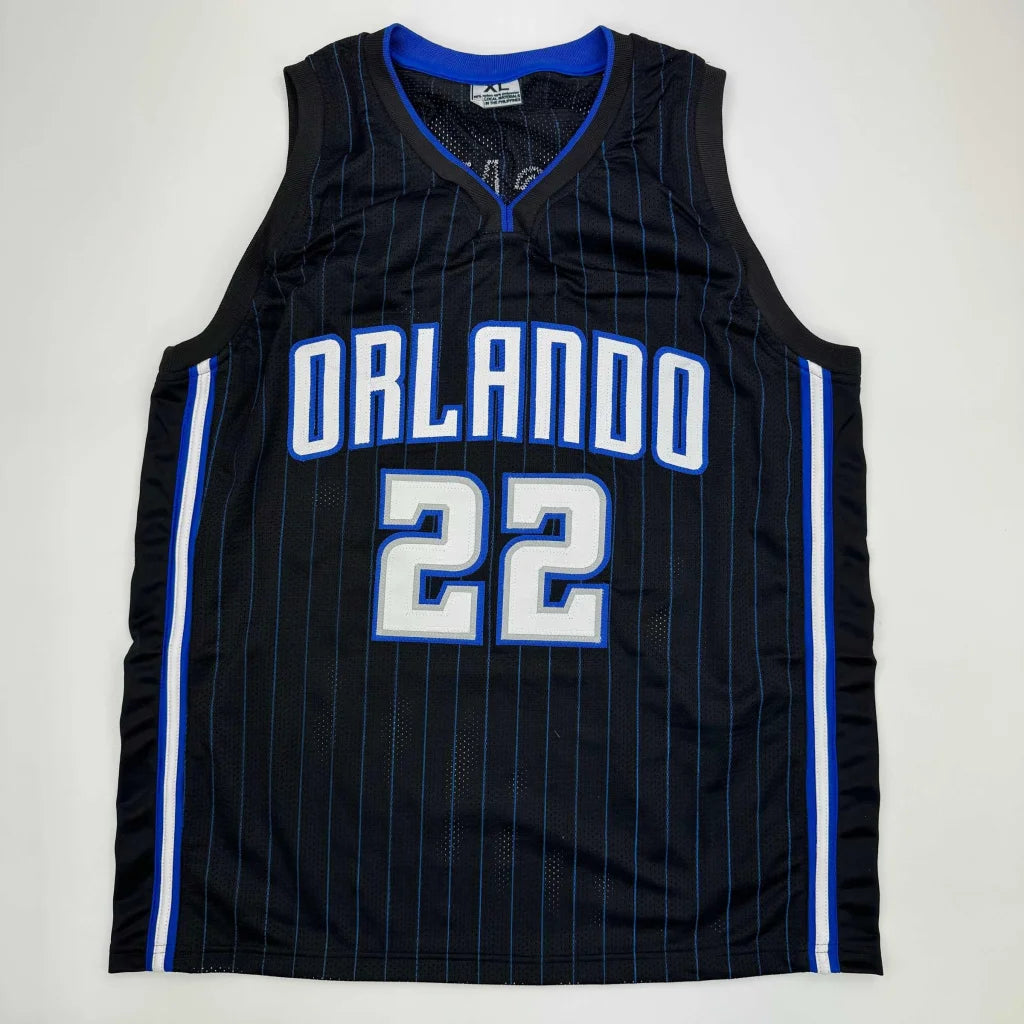 Black basketball jersey with blue and white accents from Authentic Wagner 22 Orlando Magic custom jersey for professional sports