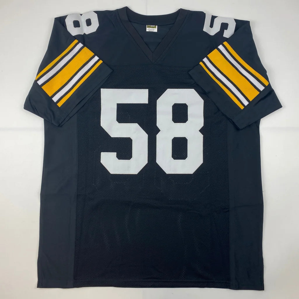 Dark navy blue custom jersey with white gold striped sleeves and bold white number 58 signed by jack lambert from professional sports league