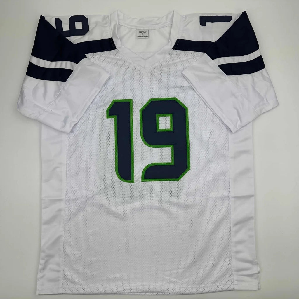 White American football jersey with navy blue and green accents, number 19, custom jersey for professional sports league