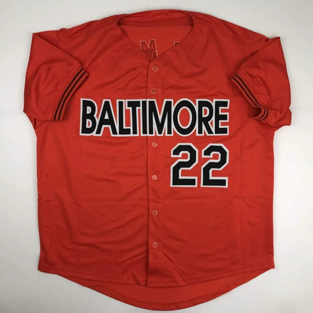 Red custom jersey from professional sports league with Baltimore 22 lettering