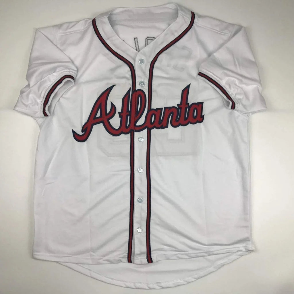 White custom jersey with red and navy trim from professional sports league Smoltz 29