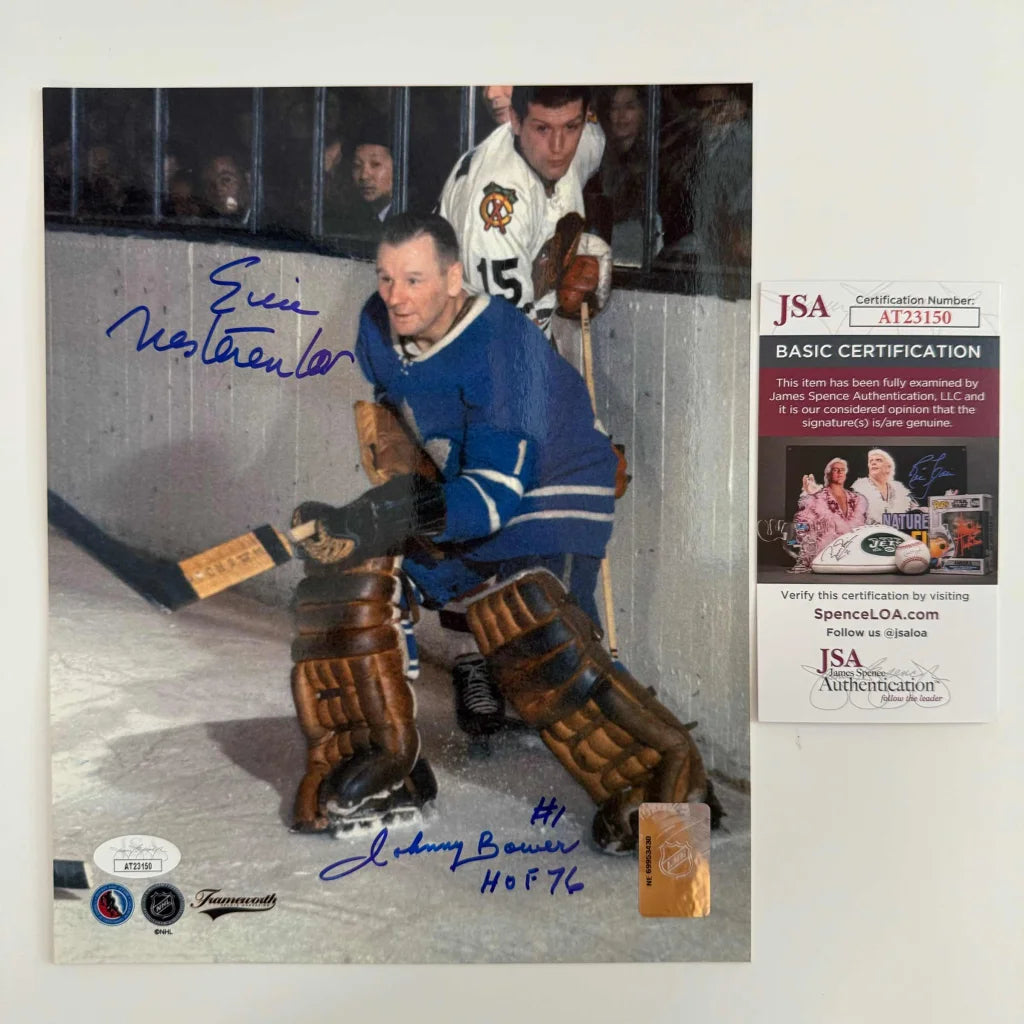 Autographed Toronto Maple Leafs photo of Johnny Bower in blue jersey and brown pads, HOF 76 signature, JSA COA