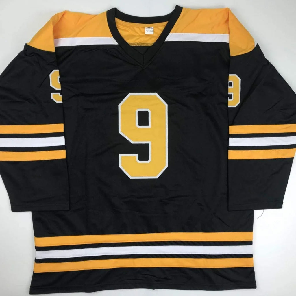 Autographed Johnny Bucyk HOF 1981 Boston Bruins custom jersey, black with yellow 9