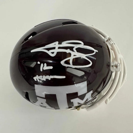 Dark maroon Texas A&M mini football helmet with white autographs and third party authentication