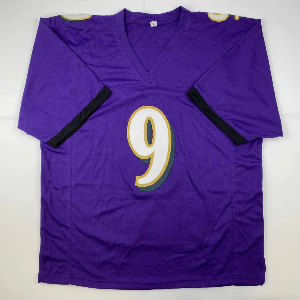 Autographed Justin Tucker purple custom jersey with white number 9, JSA COA