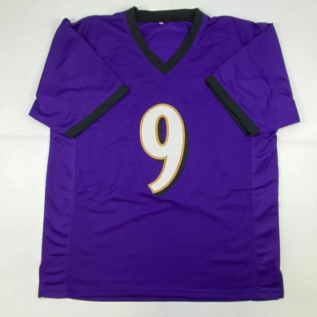Autographed Justin Tucker purple custom jersey with black trim, white 9 in gold, JSA COA