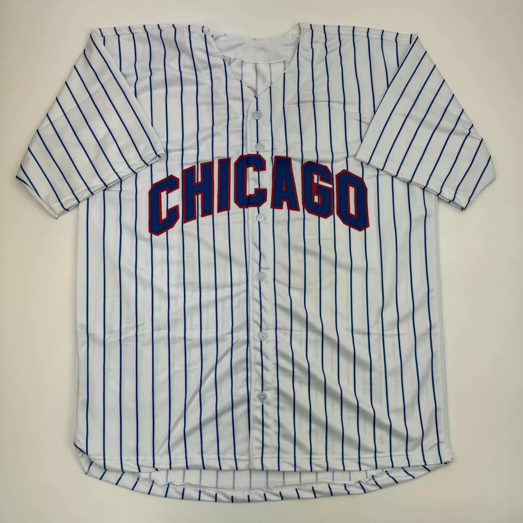 White baseball jersey with blue pinstripes and CHICAGO lettering from professional sports league