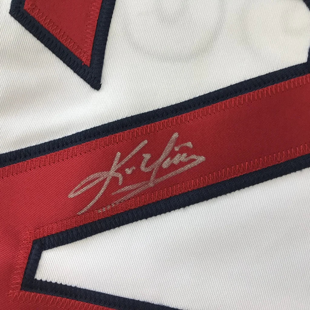 White custom jersey with red and navy trim and a gold autograph for professional sports fans
