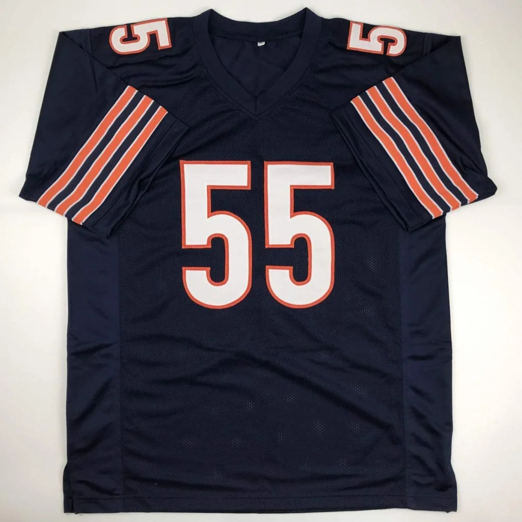 Navy blue custom jersey with white and orange numbers from Professional Sports Era