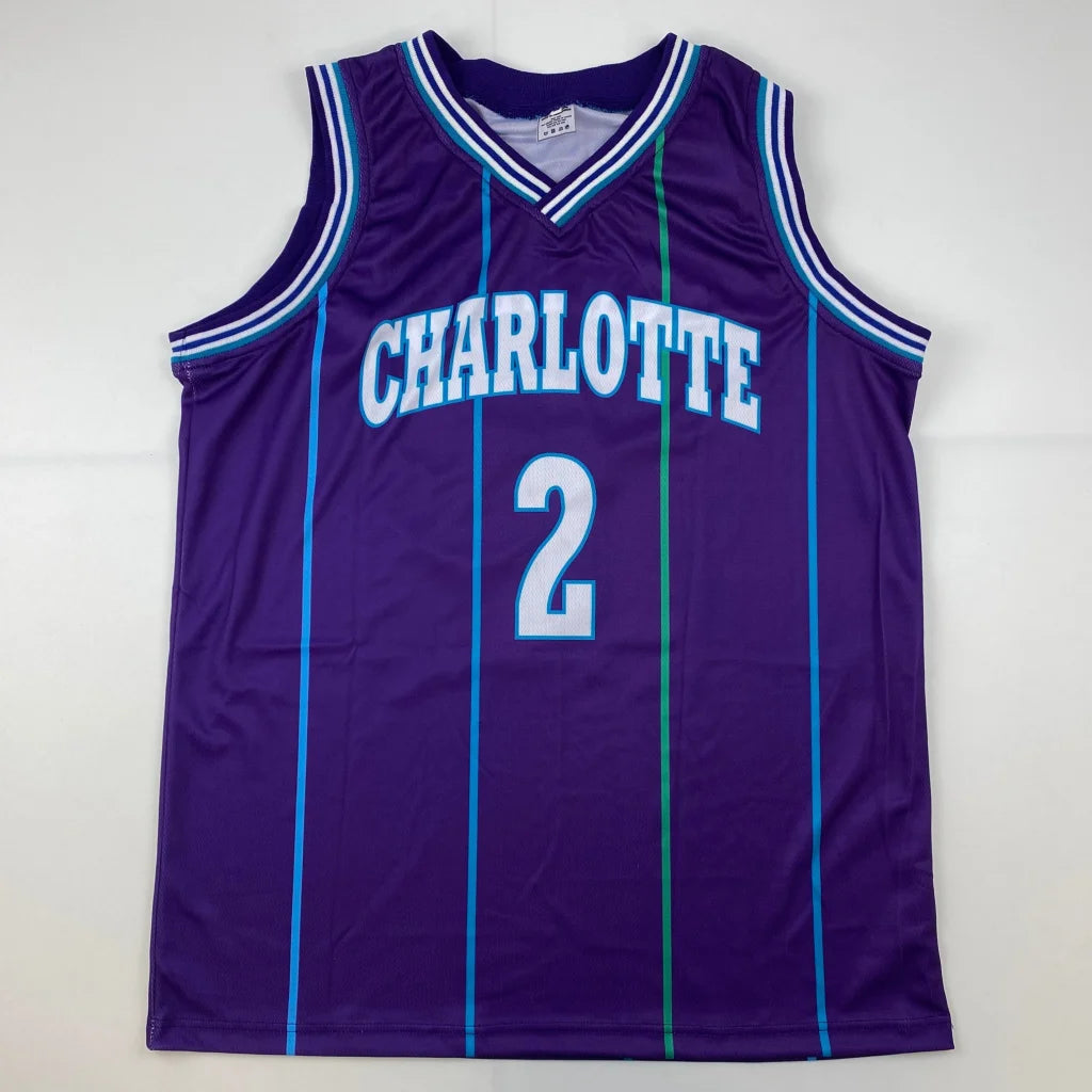 Purple custom jersey with teal and white accents from Johnson Basketball Sports League