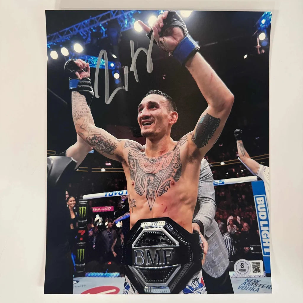 Autographed Max Holloway holding BMF belt photo with authentication for Max Holloway BMF Belt product
