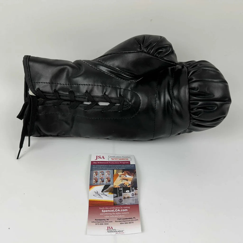 Black boxing glove with laces and certificate of authenticity for third party authentication