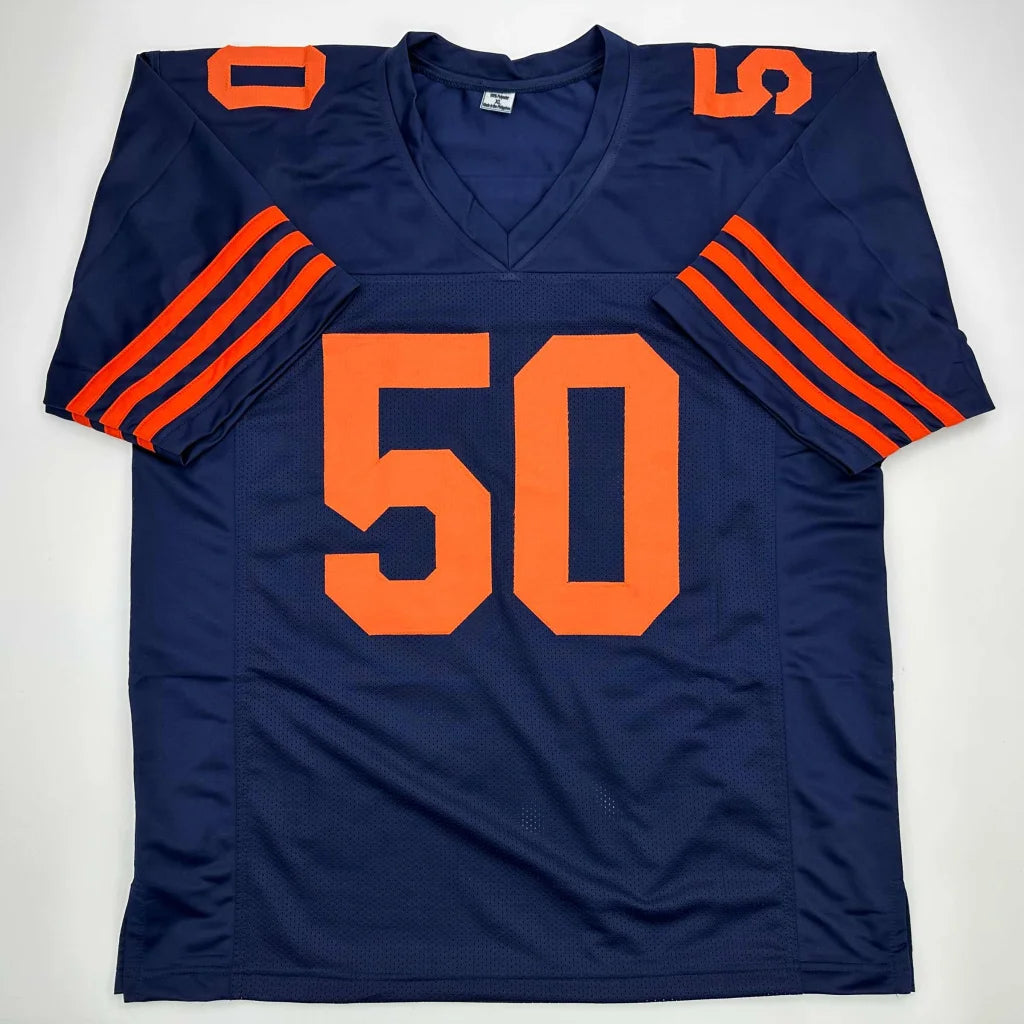 Navy blue custom jersey with orange numbers and stripes from a pro sports league collectible