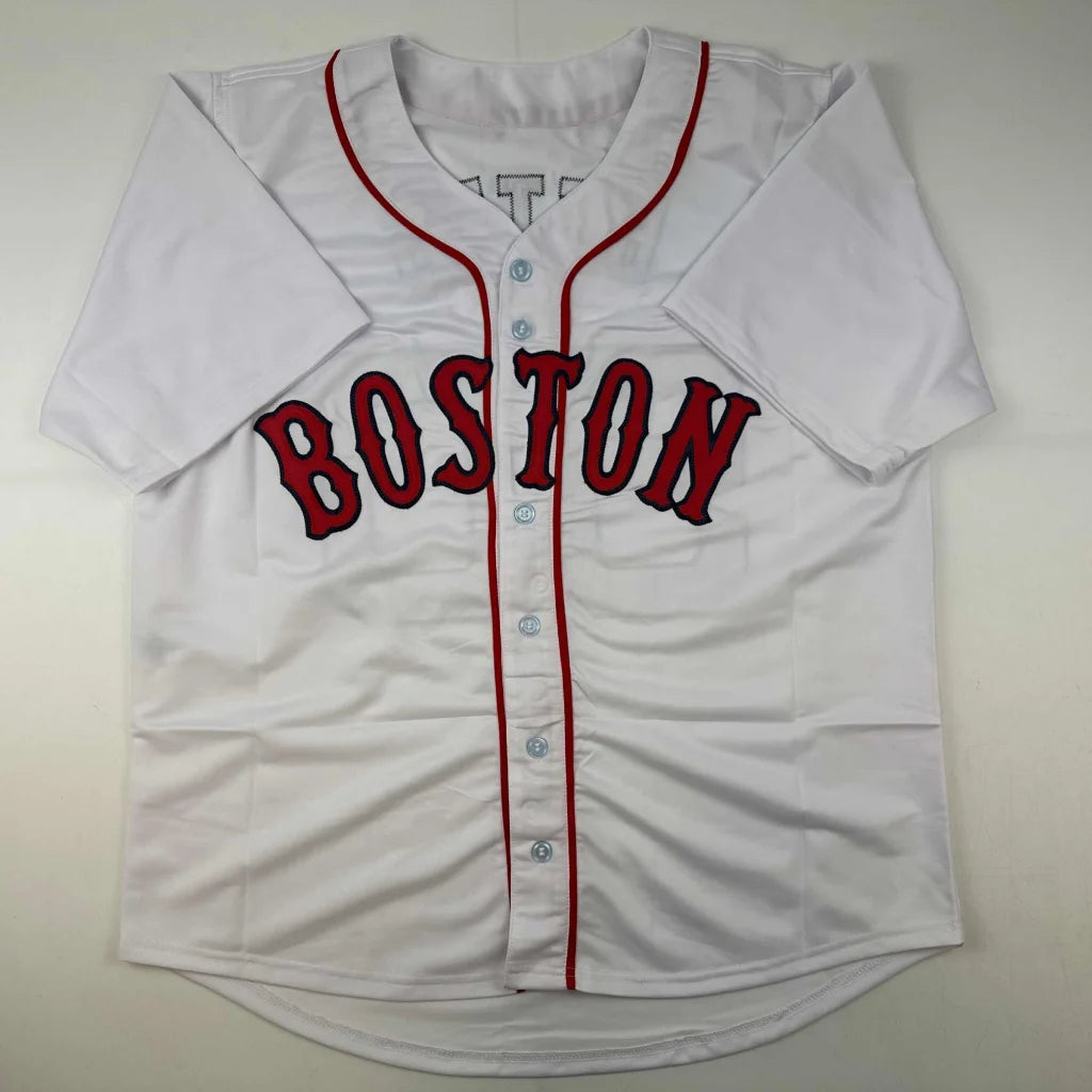 White short-sleeved baseball jersey with red piping and BOSTON for professional sports fans