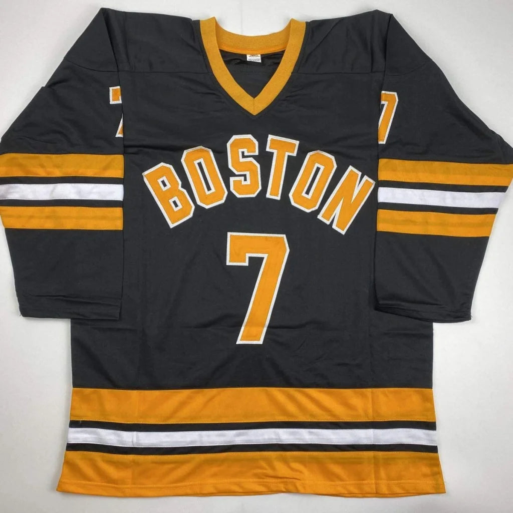 Autographed phil esposito boston black hockey jersey with gold and white accents featuring number 7 custom jersey from a professional sports league