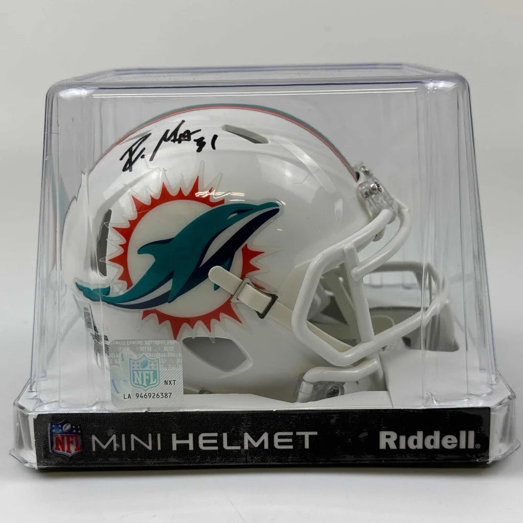 Autographed Miami Dolphins mini football helmet in display case for authentic memorabilia