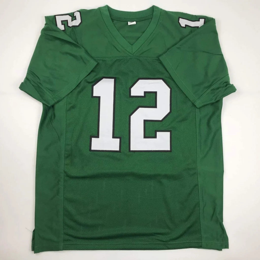 Green football jersey with white number 12 from Randall Cunningham Signed Professional Sports League
