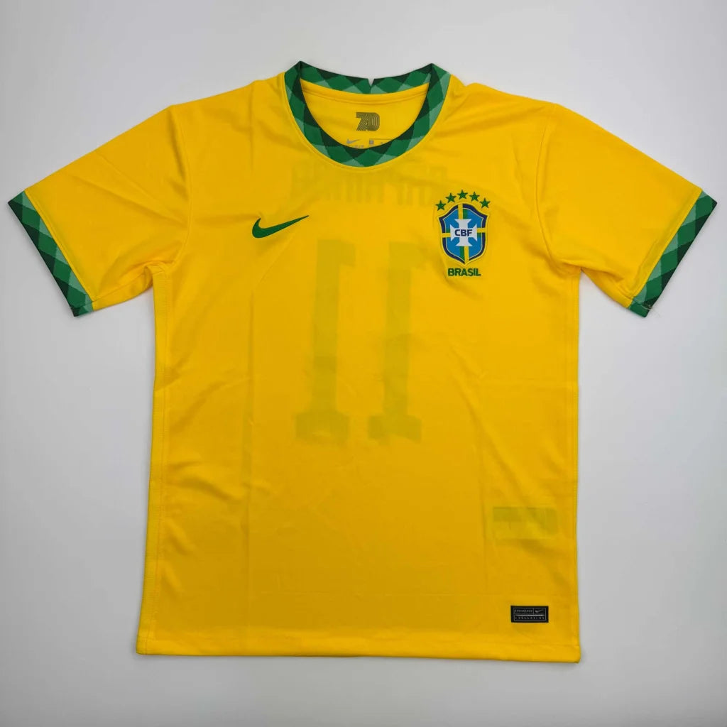 Autographed brazil yellow soccer jersey with green and white trim featuring nike swoosh for professional sports league