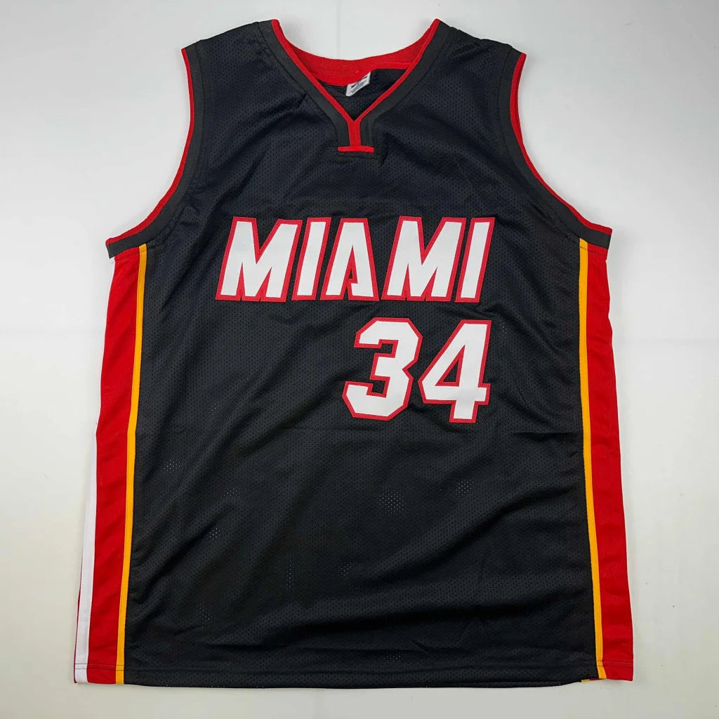 Black Miami 34 basketball jersey with red side panels and gold stripe for professional sports fans