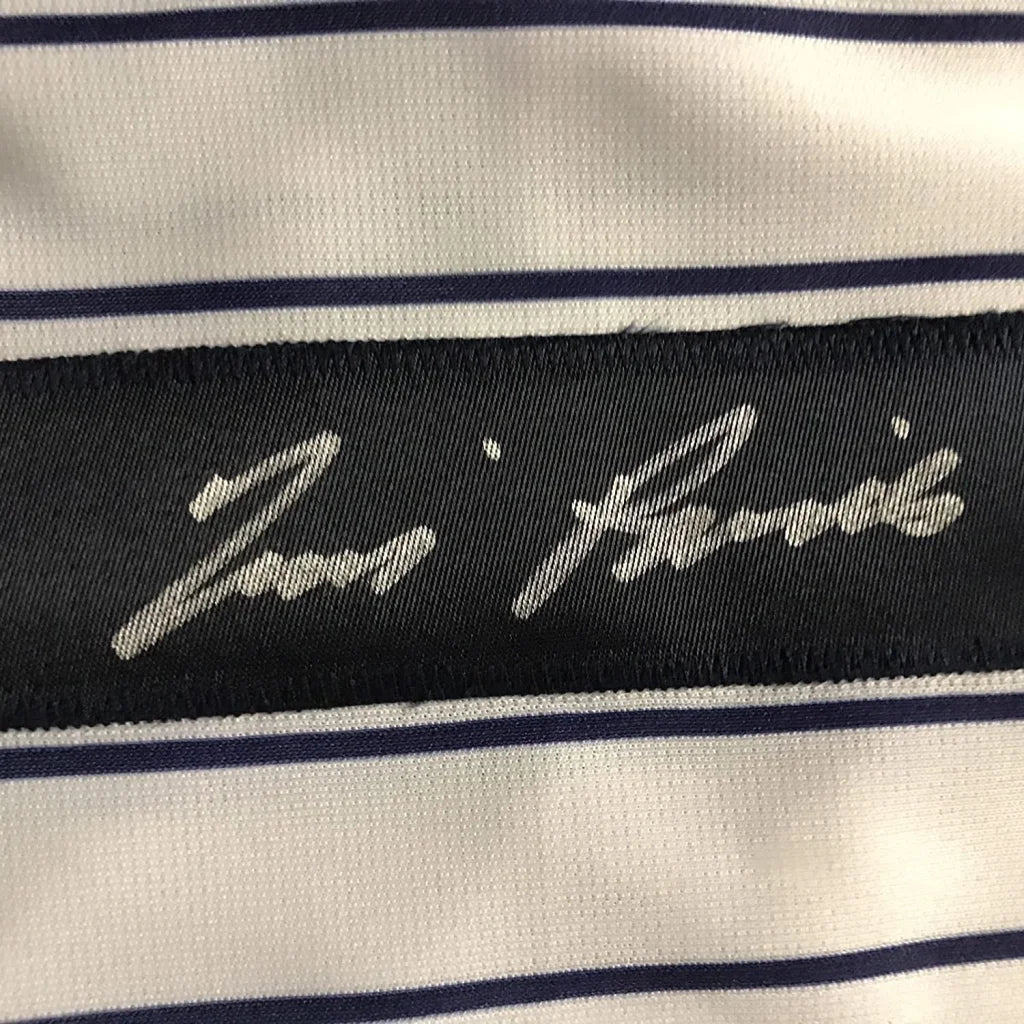 Zara label on Tim Raines autographed New York pinstripe custom jersey