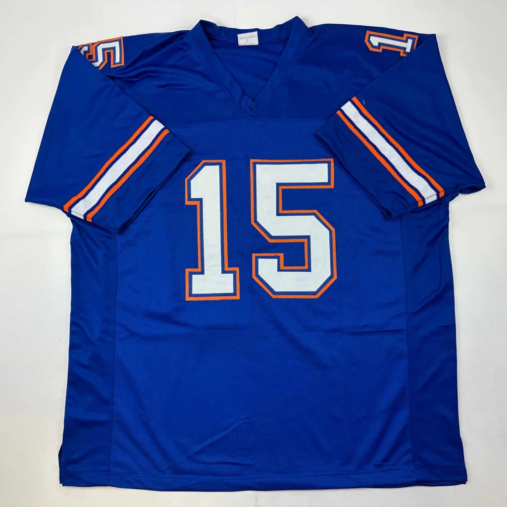 Blue Tim Tebow custom jersey with orange white trim for professional sports league fans