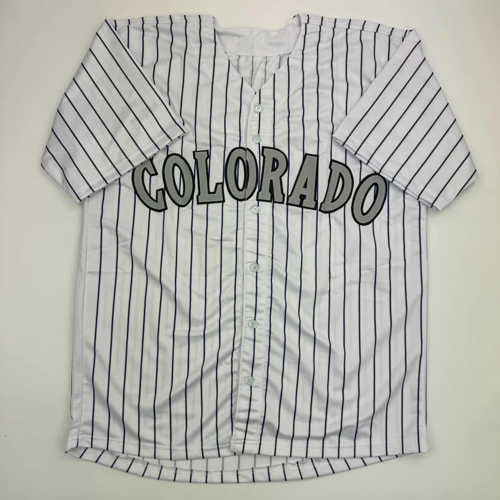 White Todd Helton HOF custom jersey with black pinstripes and Colorado lettering