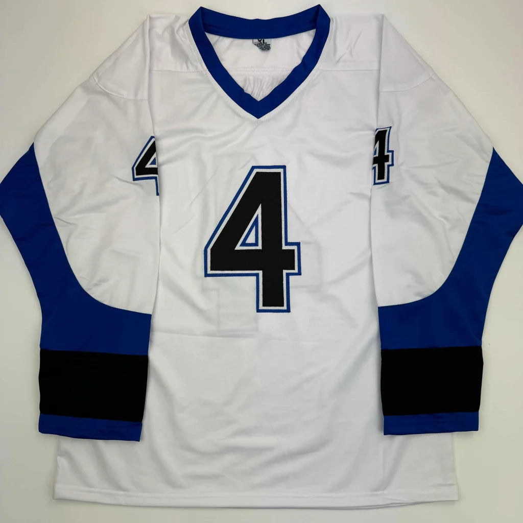 White hockey jersey with blue trim and number 4 from Rare LECAVALIER 2004 Champs sports league
