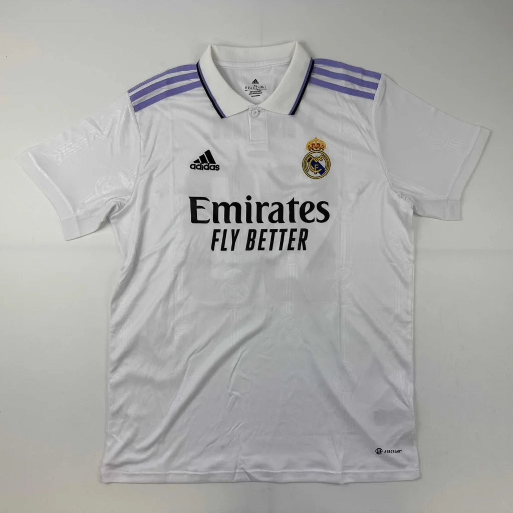 White short-sleeved Real Madrid jersey with purple shoulder stripes, third party authentication