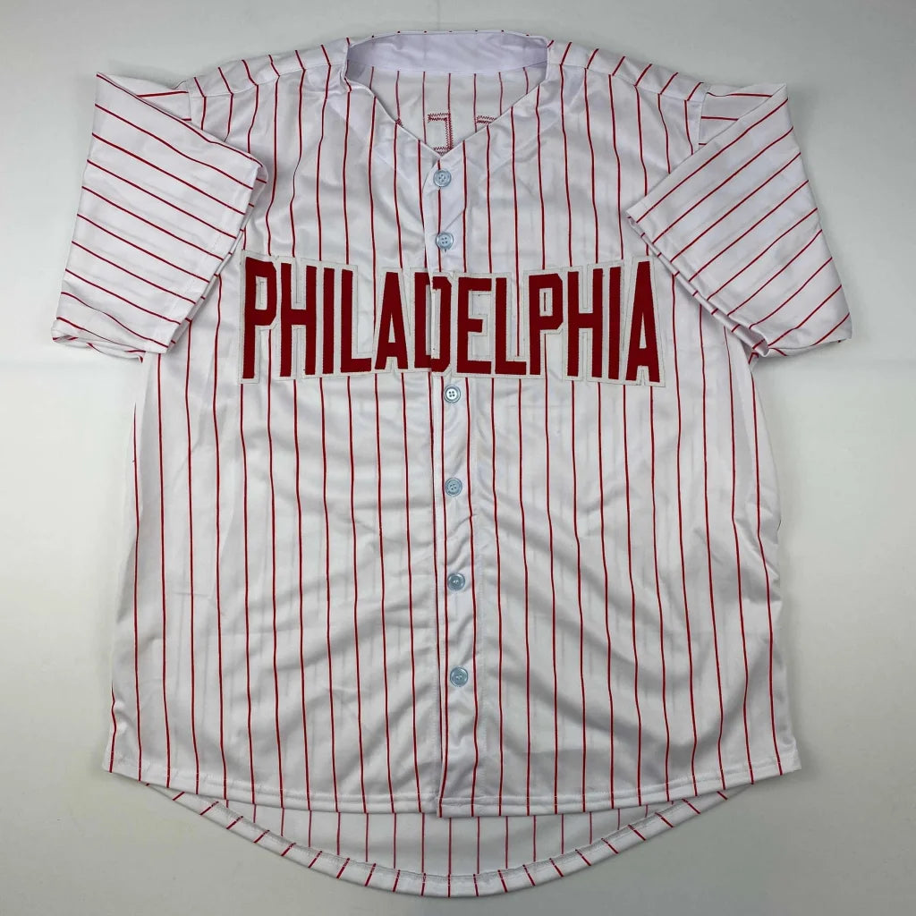 White baseball jersey with red pinstripes and PHILADELPHIA for professional sports league fans
