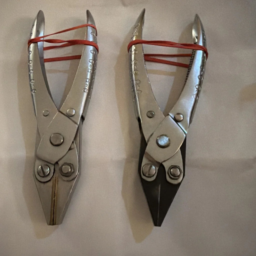 Silver-toned aviation snips sheet metal shears with red bands, left and straight cut
