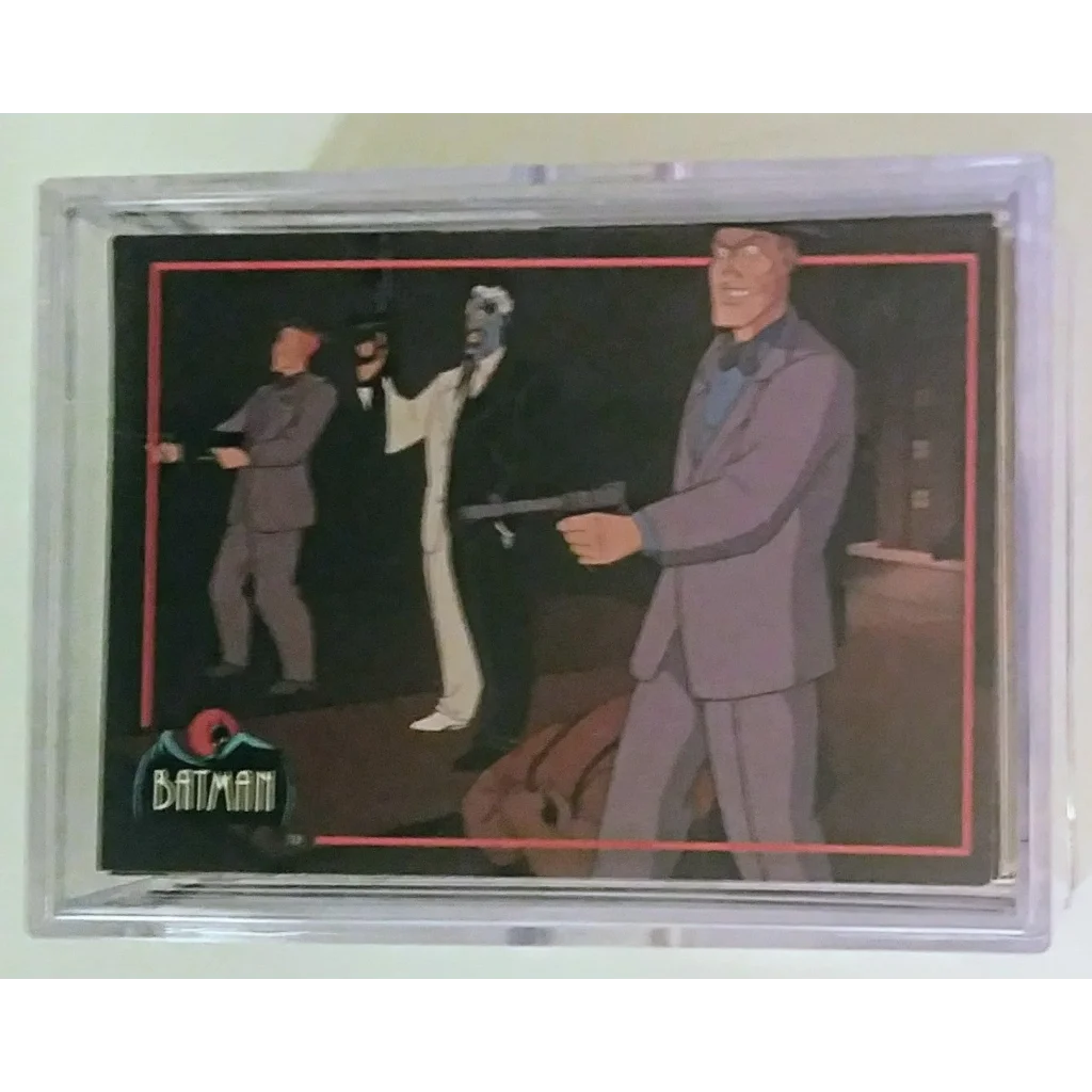 Batman Animated Series card with black background and colorful characters