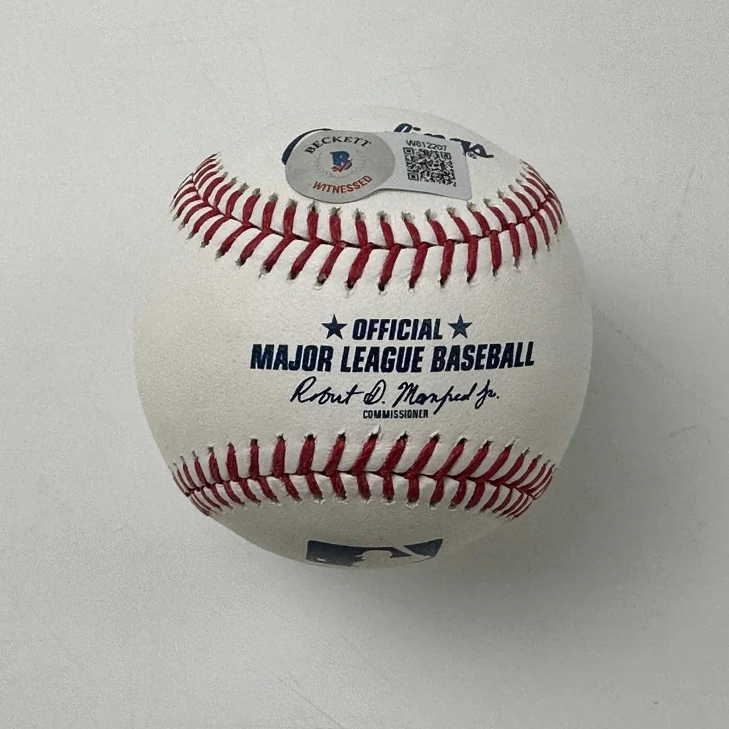 Official MLB baseball with red stitching and Beckett Witnessed authentication sticker