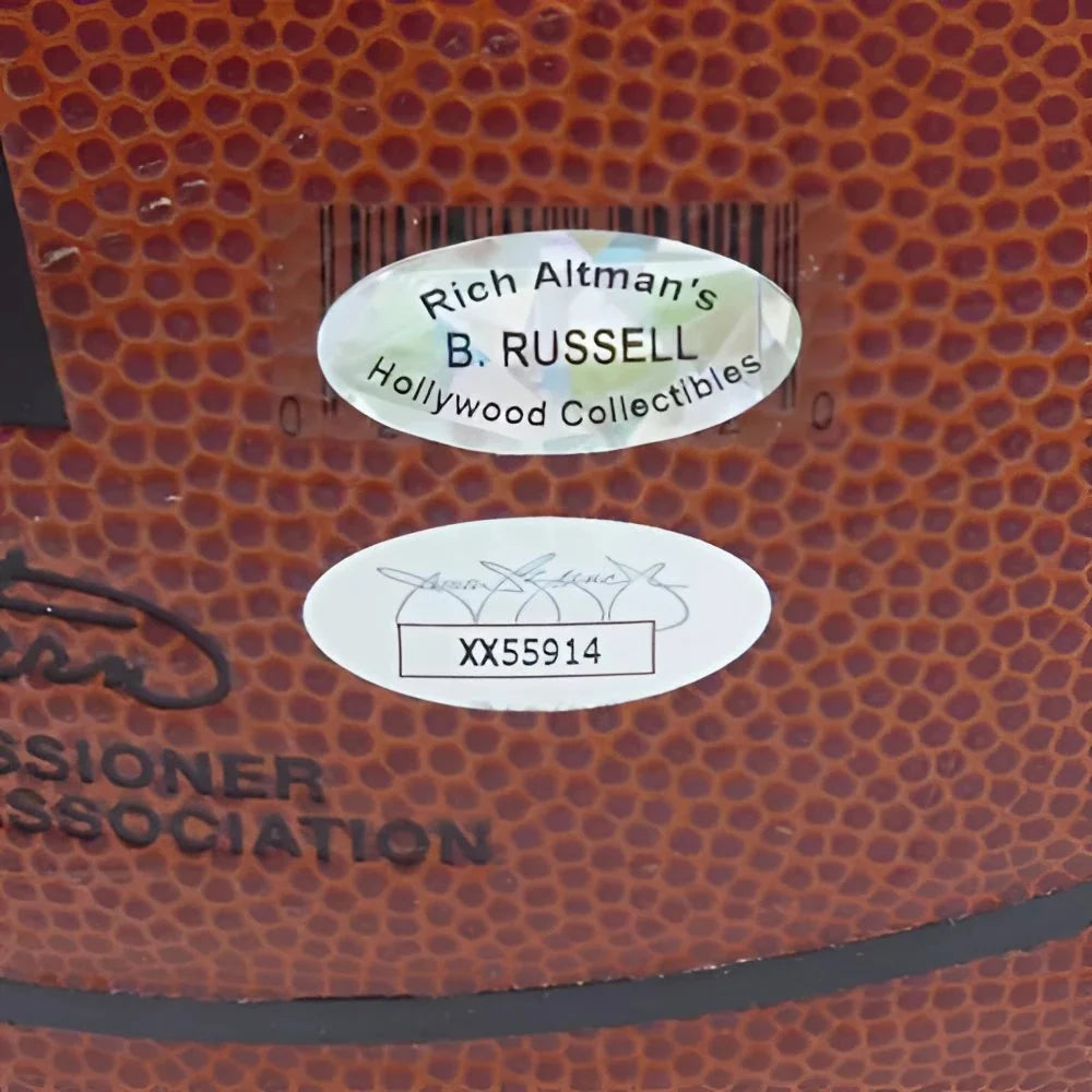 Bill Russell autographed brown leather NBA basketball with Hollywood Collectibles branding