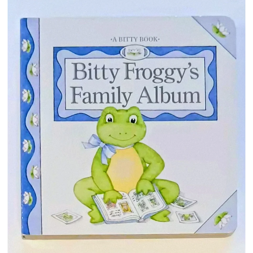 Bitty Baby board book cover with green frog and blue ribbon