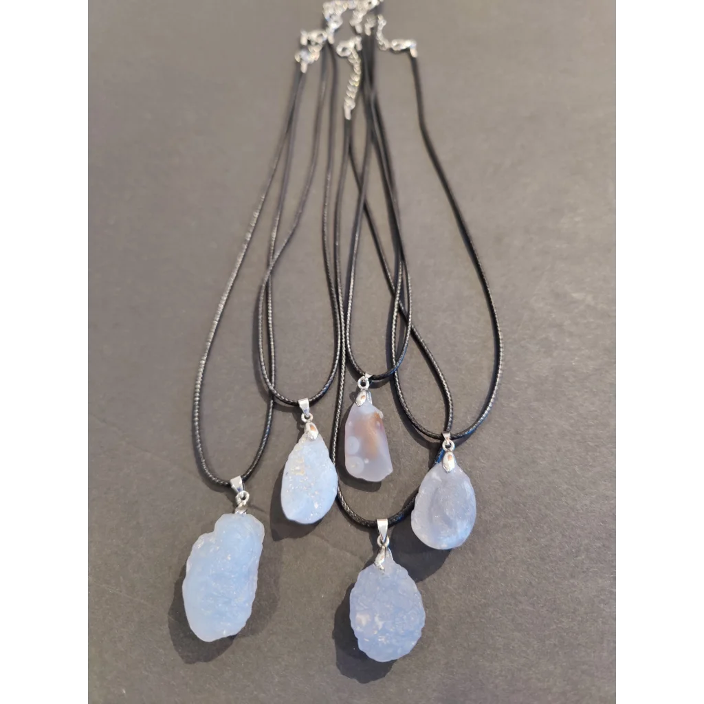 Set of five Gobi Desert blue chalcedony raw stone pendant necklaces