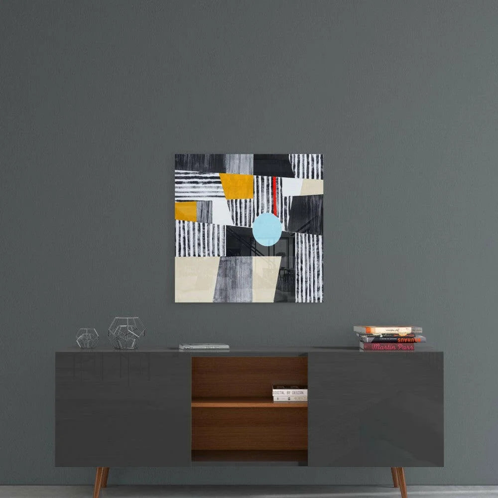 Bold stripes glass wall art with blue circle accent on dark gray wall