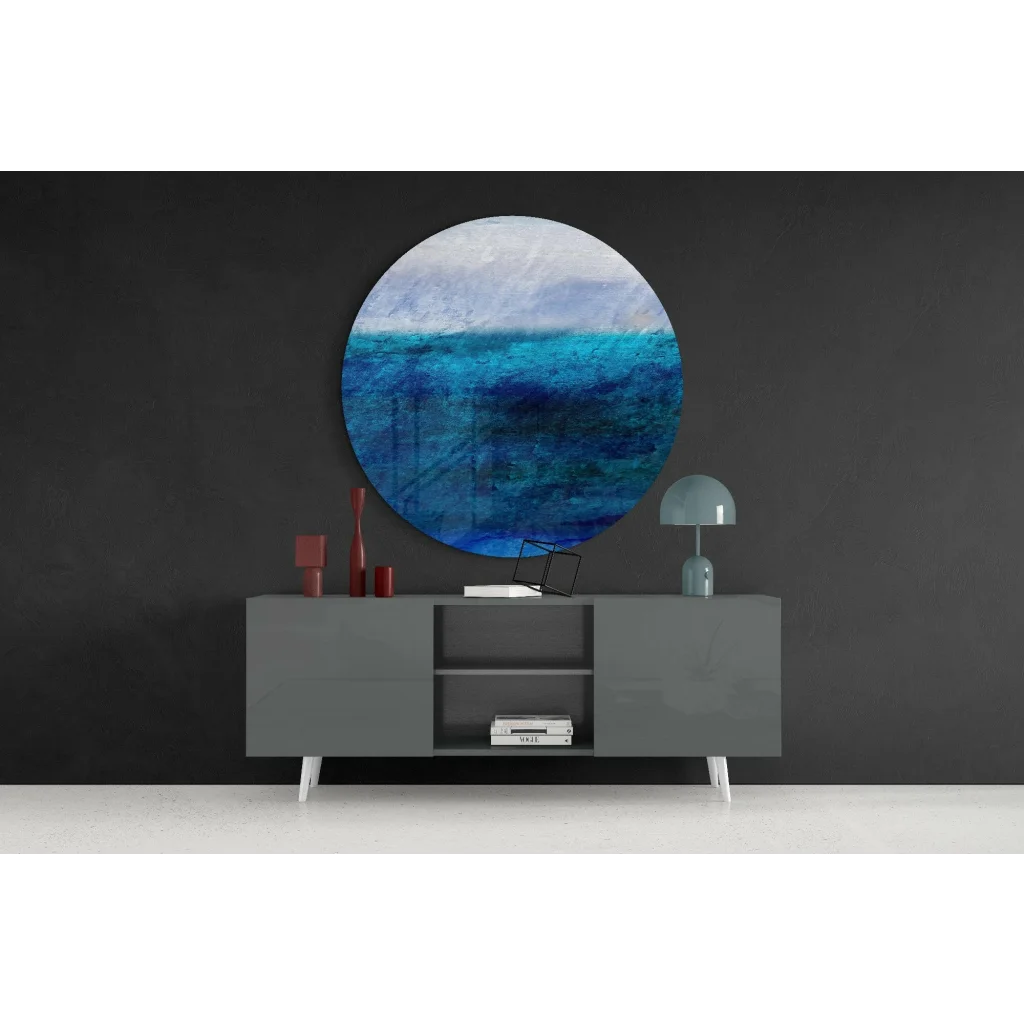 Stunning ocean blue tempered glass art with textured hues on gray console