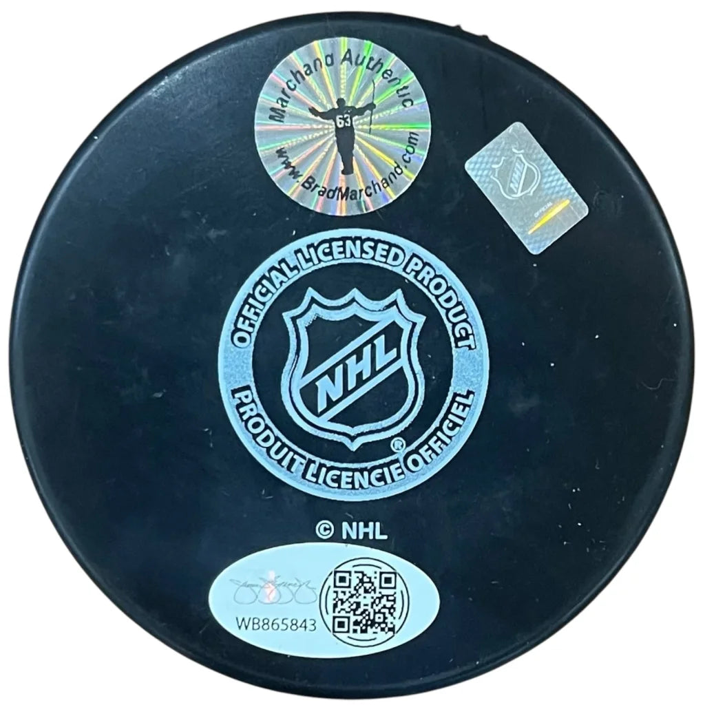 Brad Marchand autographed Florida Panthers hockey puck with NHL stickers