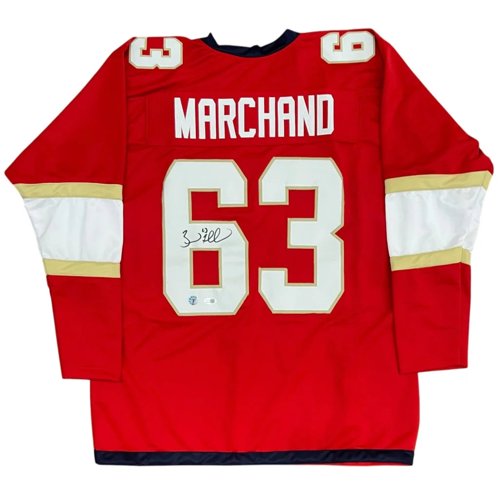 Red florida panthers hockey custom jersey in red with white and gold stripes navy v-neck collar signed by brad marchand