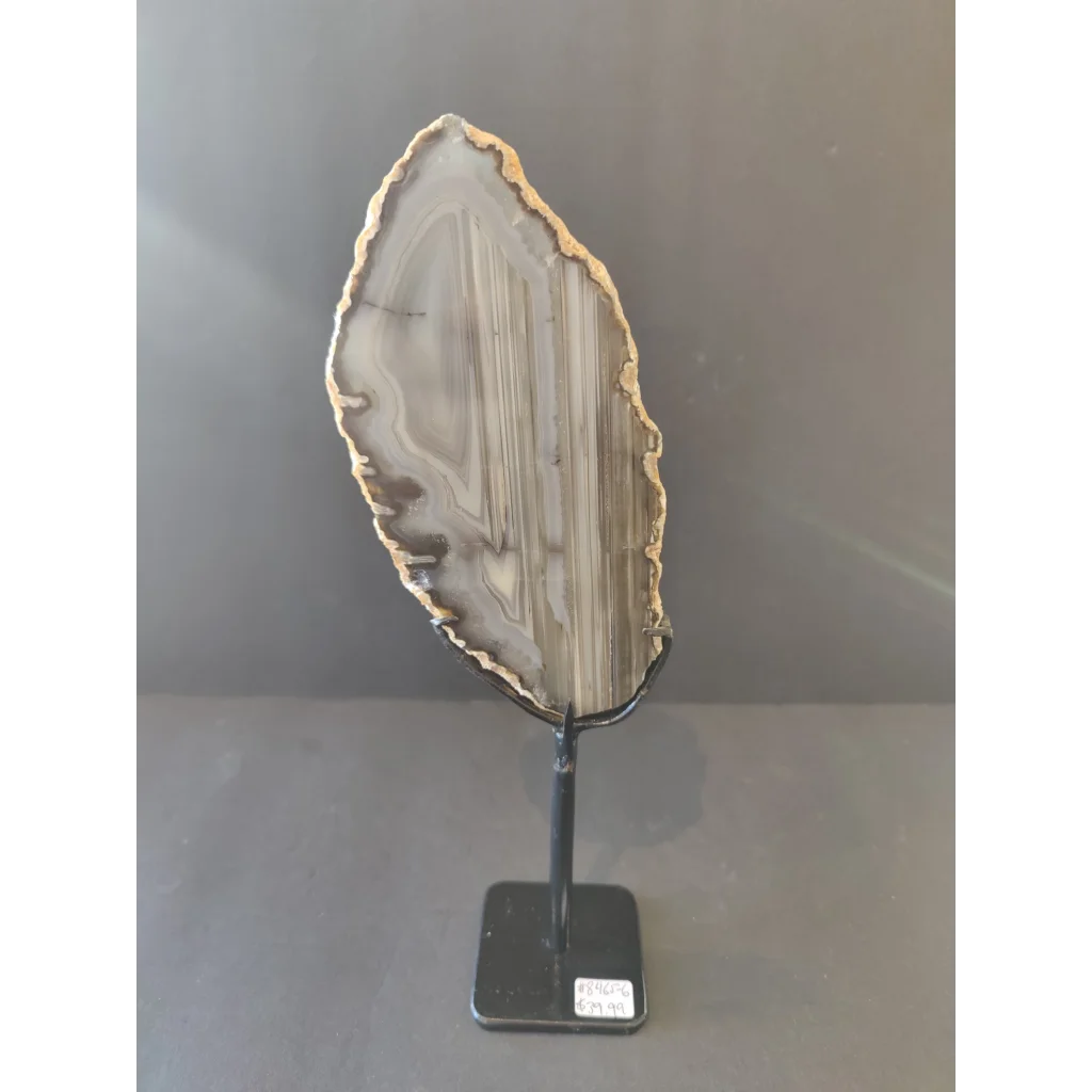 Polished Brazilian agate slice on metal display stand