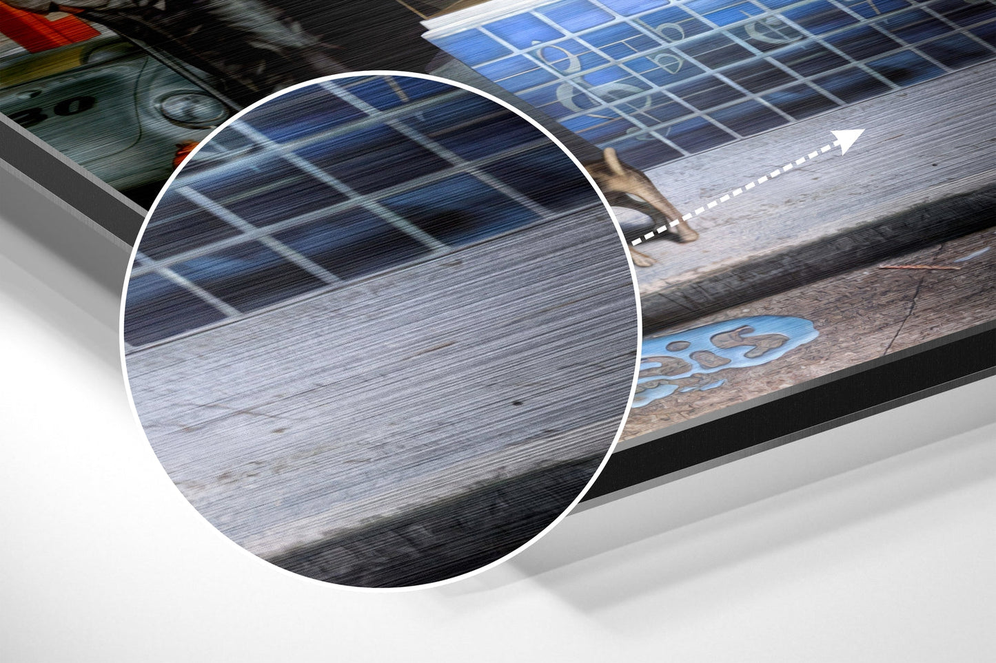 Close-up detail of brushed aluminium surface showing horizontal grain texture and blue solar panel grid pattern in background.
