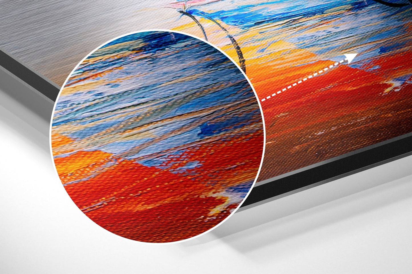 Close-up detail of brushed aluminium boat art showing vibrant blue, orange, and red striped patterns with circular magnified section.