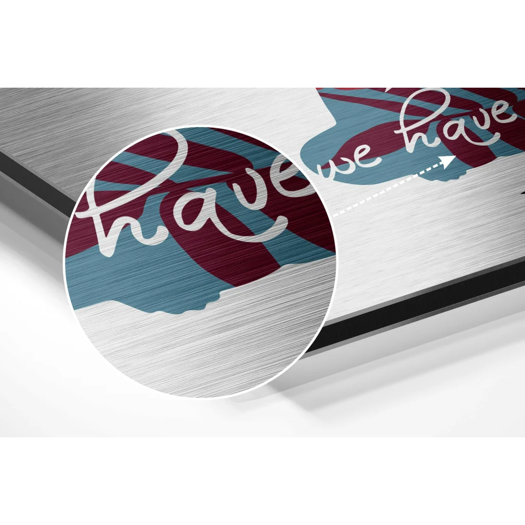 Modern brushed aluminium dibond print with maroon teal stripes and have we have text