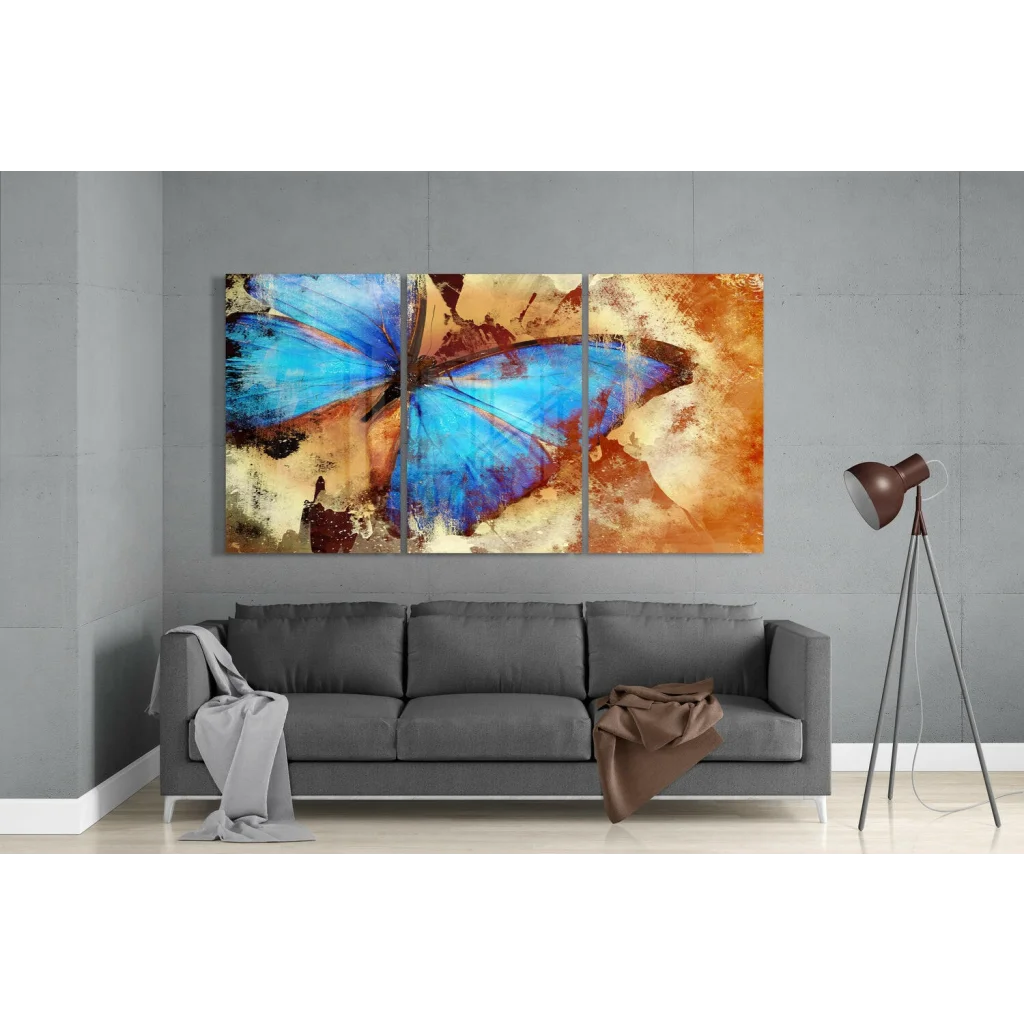 Vibrant blue butterfly glass wall art triptych on textured canvas