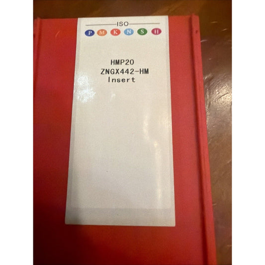 White label with "HMP20 ZNGX442-HM Insert" text and ISO PKM KNS II logos affixed to red cardboard packaging.