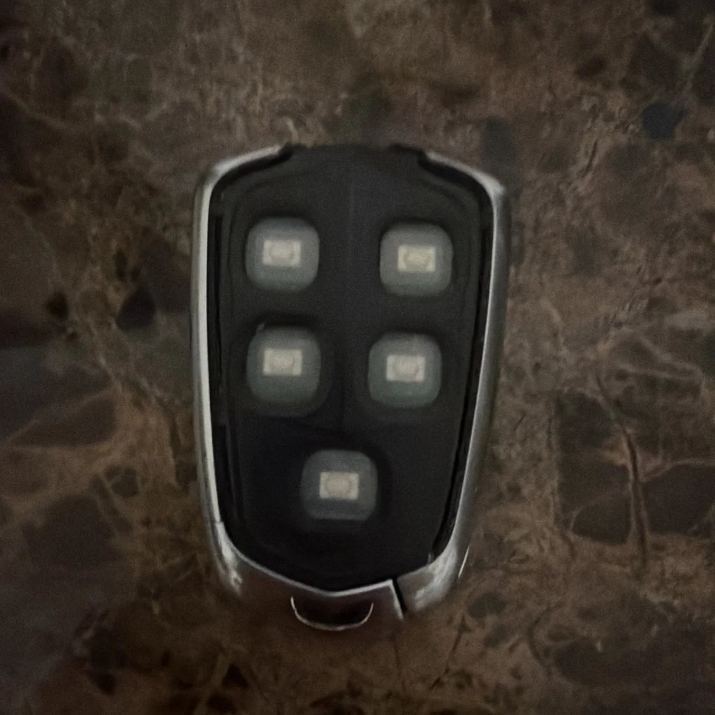 Cadillac XT4 2019 key fob black silver remote with 5-button grid