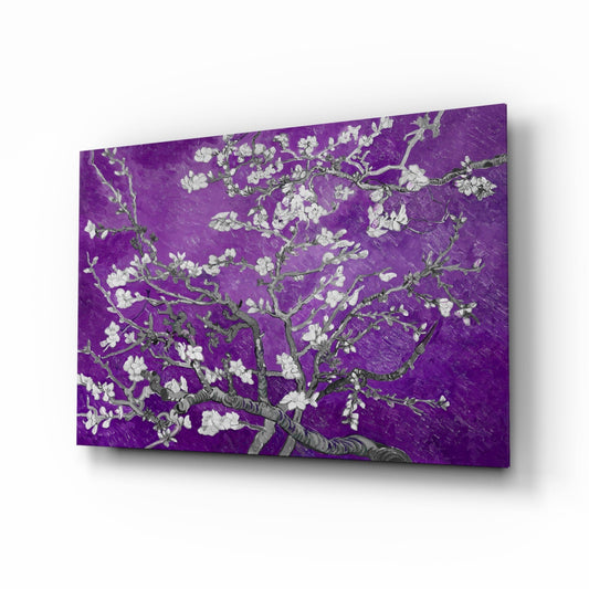 Purple glass wall art with white blossoms and gray branches displayed at an angled perspective showing depth and shadow.