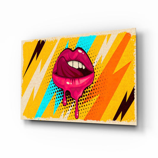 Pop art glass wall art featuring a magenta dripping lips design with yellow, orange, cyan, and black lightning bolts on a textured beige background.